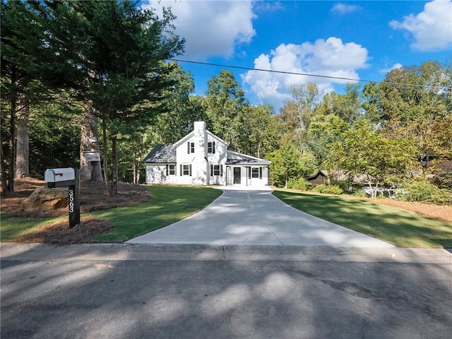 view of front of home with a front yard