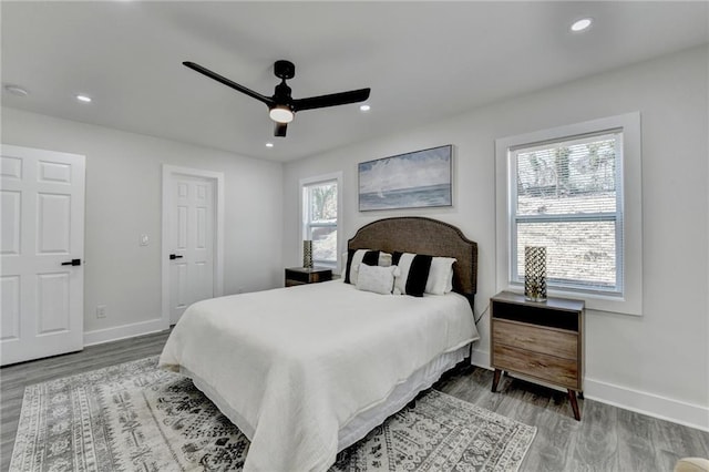 bedroom with recessed lighting and baseboards