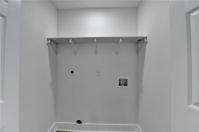 laundry area featuring washer hookup, laundry area, electric dryer hookup, and baseboards