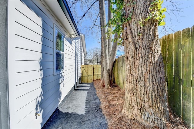 view of property exterior with fence