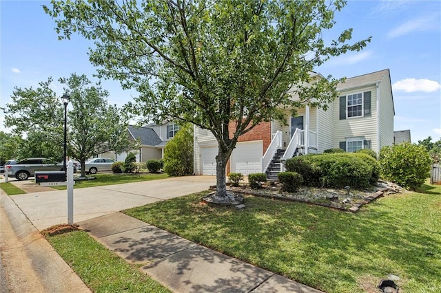 1910 Towne Park Dr, Mcdonough, GA 30252 - obstructed view of property with driveway, a front yard, and brick siding