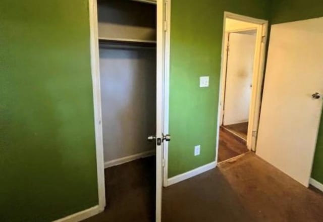 unfurnished bedroom with a closet