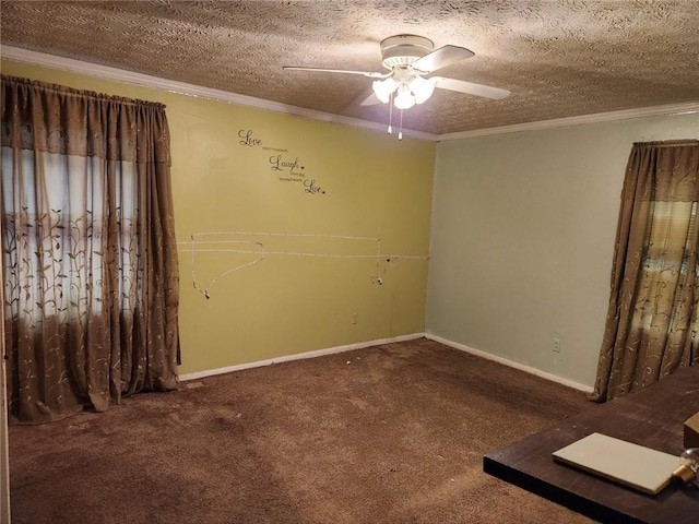 carpeted spare room featuring ceiling fan, ornamental molding, and a textured ceiling