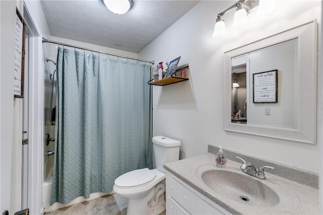 full bathroom with toilet, vanity, shower / bath combo, and a textured ceiling