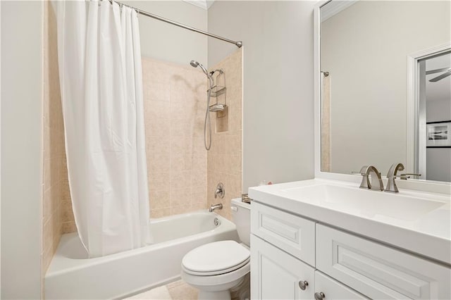 full bathroom with ceiling fan, shower / bath combo with shower curtain, vanity, tile patterned floors, and toilet