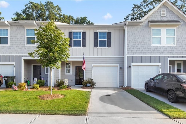 244 Grand Central Way, Cartersville, GA 30120 - multi unit property featuring driveway, board and batten siding, a garage, and a front lawn