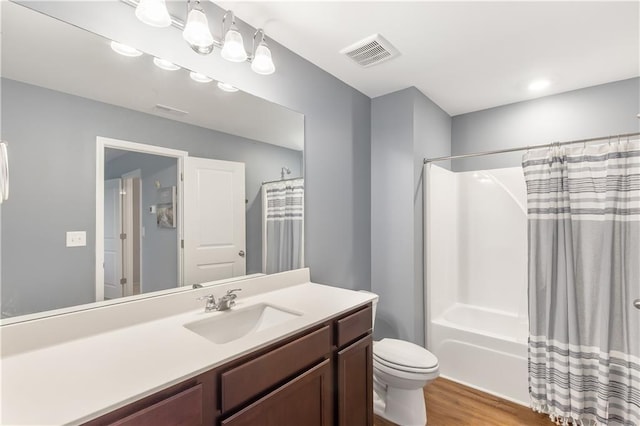 244 Grand Central Way, Cartersville, GA 30120 - full bathroom featuring vanity, wood finished floors, toilet, and shower / bath combination with curtain