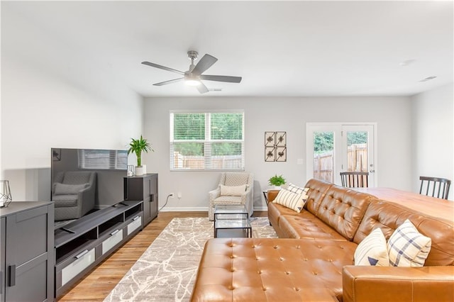 244 Grand Central Way, Cartersville, GA 30120 - living room featuring light wood-type flooring, ceiling fan, and baseboards