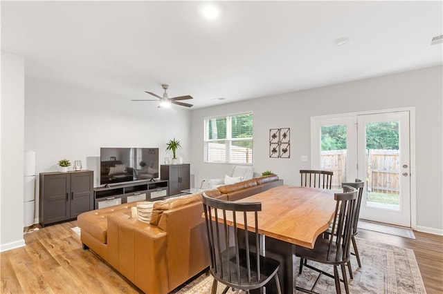 244 Grand Central Way, Cartersville, GA 30120 - dining room featuring light wood-style floors, ceiling fan, and baseboards