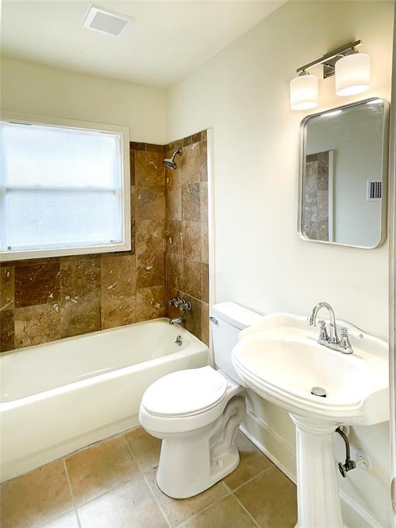 empty room with recessed lighting, dark wood-style flooring, and baseboards