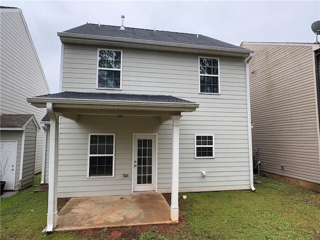 241 Coral Cir, Mcdonough, GA 30253 - back of property featuring a patio area, a lawn, a storage shed, and an outdoor structure
