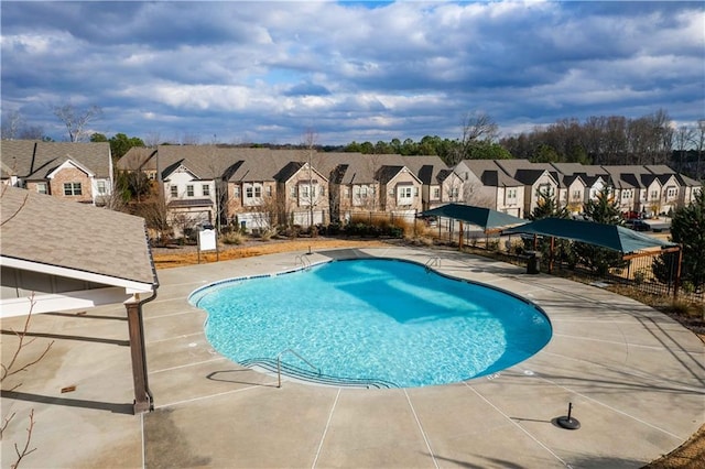 view of swimming pool featuring a patio