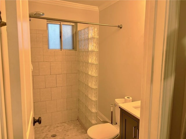 375 6th St NE Unit 5, Atlanta, GA 30308 - full bath with ornamental molding, vanity, toilet, a tile shower, and tile patterned floors