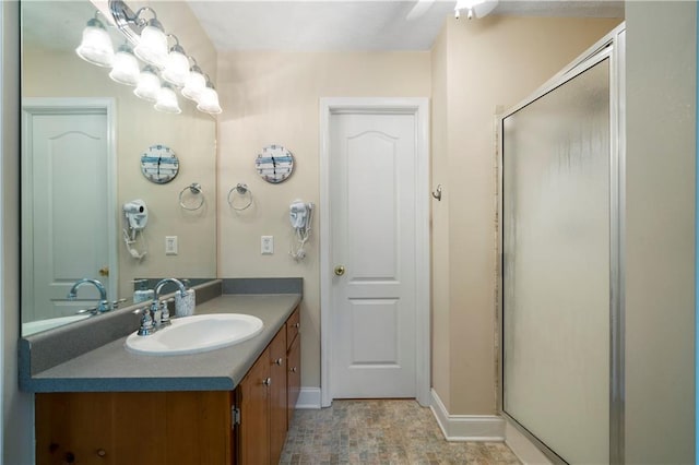 2281 Carlan Rd, Jasper, GA 30139 - bathroom with a shower stall, vanity, and baseboards