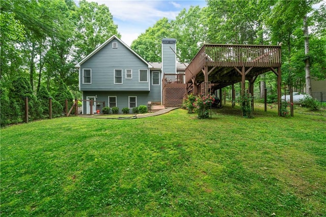 2281 Carlan Rd, Jasper, GA 30139 - back of property featuring a deck, stairway, and a yard