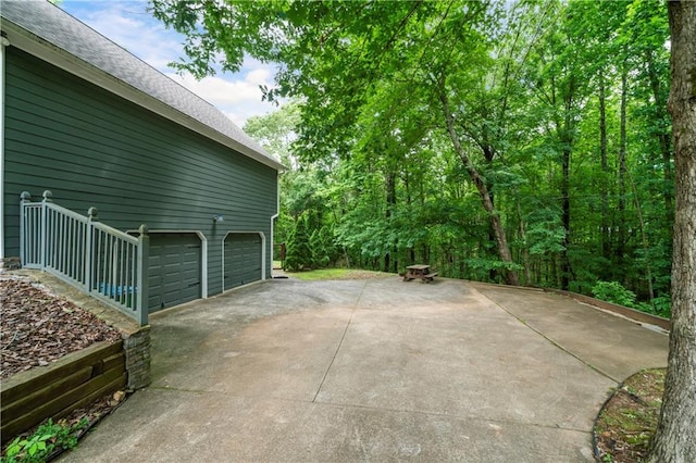 2281 Carlan Rd, Jasper, GA 30139 - garage with concrete driveway