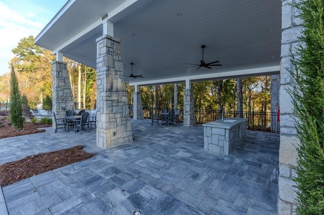 view of patio / terrace featuring ceiling fan