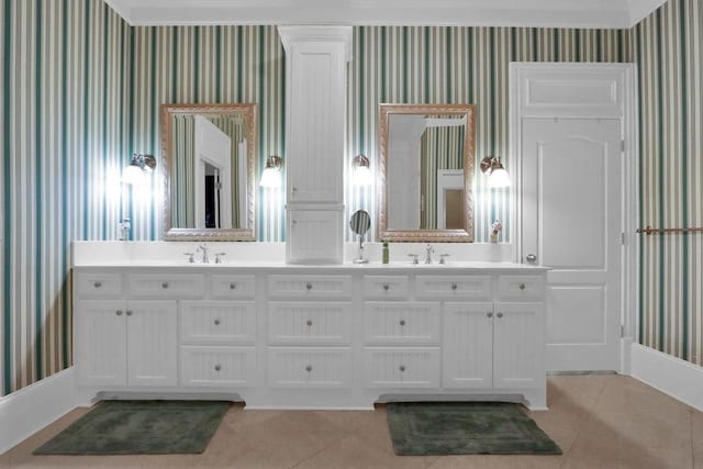 bathroom featuring tile patterned flooring and dual bowl vanity