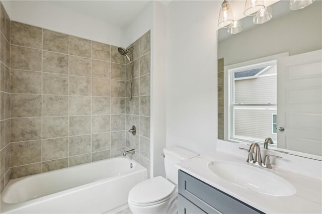 full bath with vanity, bathing tub / shower combination, and toilet