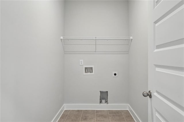 laundry room with baseboards, laundry area, hookup for a washing machine, tile patterned floors, and hookup for an electric dryer