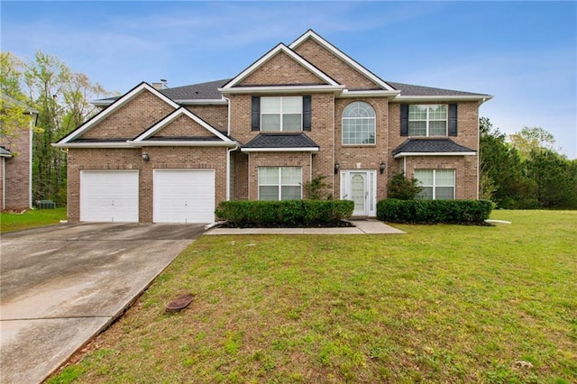 view of front facade featuring a front yard and a garage