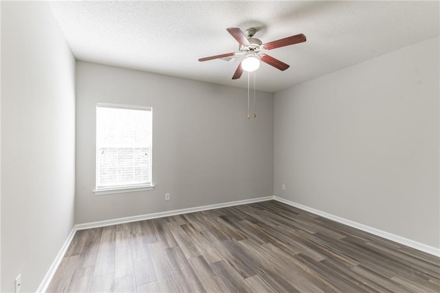 unfurnished room featuring hardwood / wood-style flooring, a textured ceiling, and ceiling fan