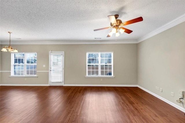 unfurnished room featuring dark wood-type flooring, crown molding, ceiling fan with notable chandelier, and a textured ceiling