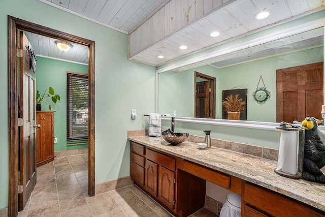 bathroom featuring vanity and wood ceiling