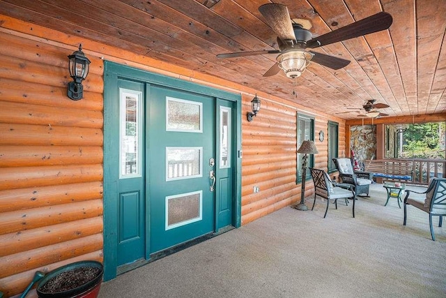 exterior space featuring ceiling fan and a porch