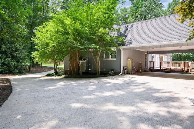 rear view of property with a deck