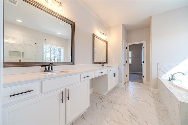 bathroom with vanity and plus walk in shower