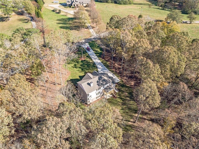 birds eye view of property with a rural view