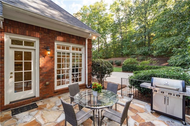 view of patio / terrace with outdoor dining area and grilling area