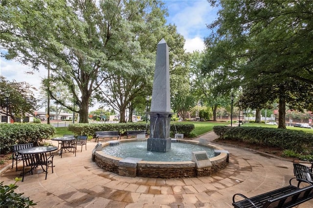 surrounding community featuring a patio