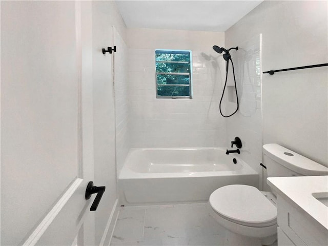 full bathroom featuring vanity, toilet, and tiled shower / bath