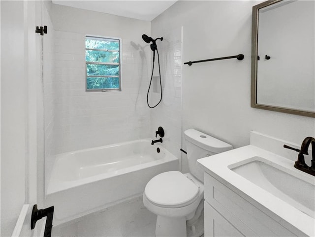 full bathroom with vanity, toilet, and tiled shower / bath