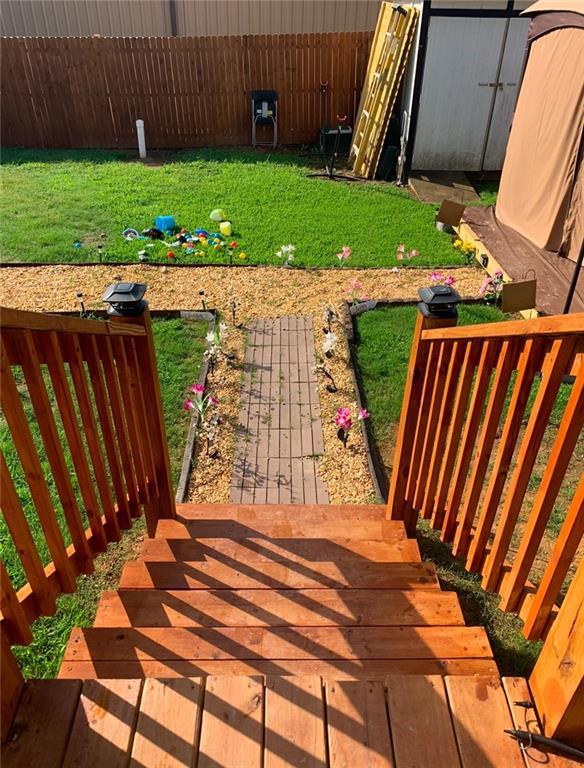 view of yard featuring a wooden deck