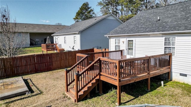 deck featuring a lawn