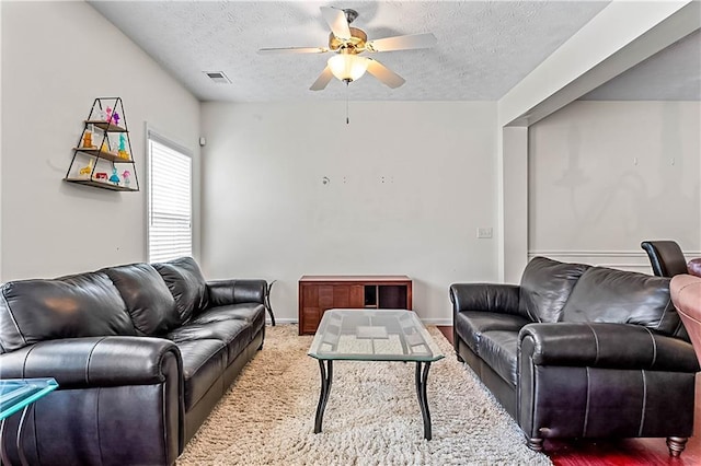 2555 Flat Shoals Rd Unit 2006, Atlanta, GA 30349 - living area with a textured ceiling and ceiling fan