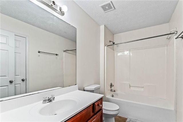 2555 Flat Shoals Rd Unit 2006, Atlanta, GA 30349 - bathroom with vanity,  shower combination, and a textured ceiling