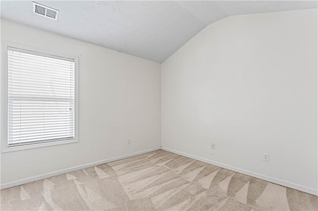 2555 Flat Shoals Rd Unit 2006, Atlanta, GA 30349 - empty room with lofted ceiling and light carpet