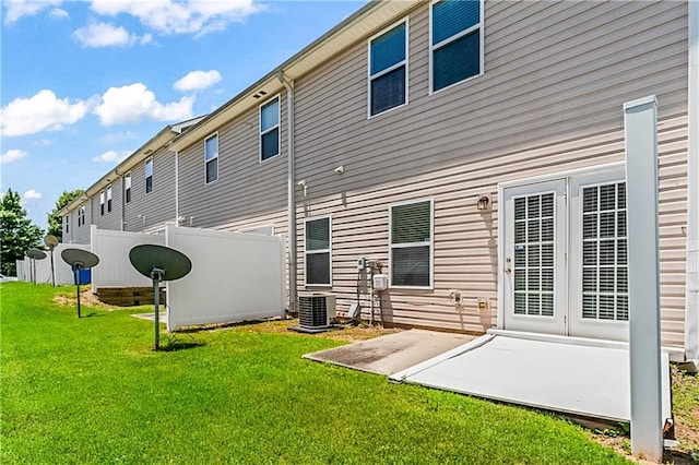 2555 Flat Shoals Rd Unit 2006, Atlanta, GA 30349 - back of property featuring a patio area