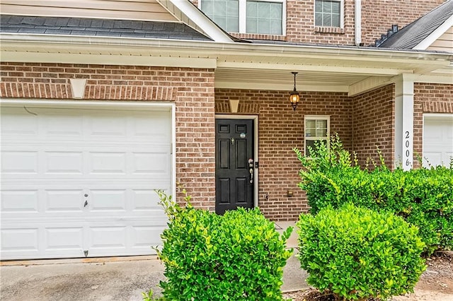 2555 Flat Shoals Rd Unit 2006, Atlanta, GA 30349 - doorway to property with brick siding and a porch