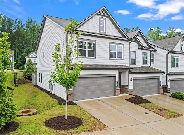 359 Crider Ct, Woodstock, GA 30188 - view of front of property featuring a garage, a front yard, concrete driveway, and a shingled roof