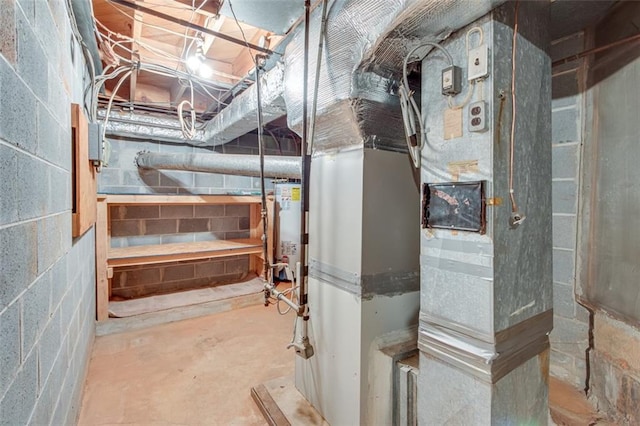 utility room with water heater