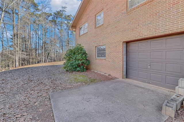 view of home's exterior with a garage