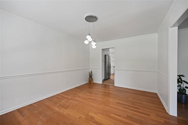 3332 Saint John Dr, East Point, GA 30344 - unfurnished dining area with ornamental molding, wood finished floors, and baseboards