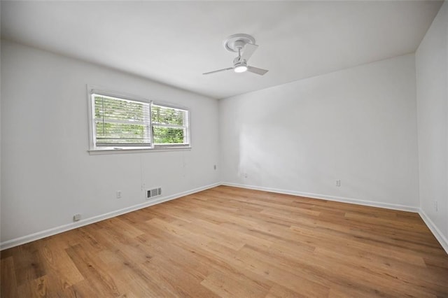 3332 Saint John Dr, East Point, GA 30344 - unfurnished room featuring ceiling fan, light wood-style floors, and baseboards