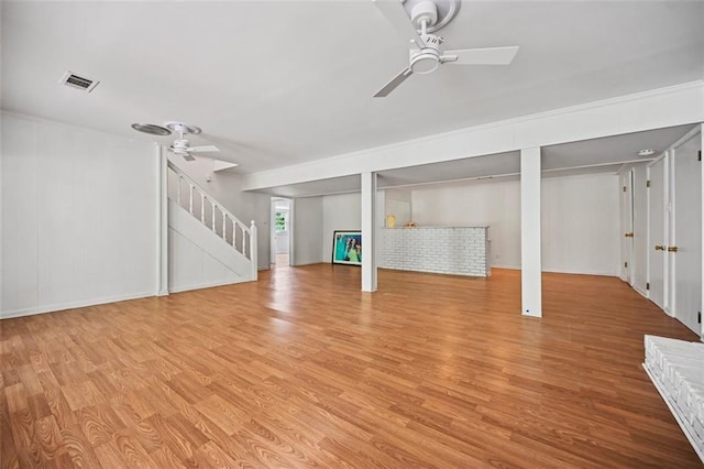 3332 Saint John Dr, East Point, GA 30344 - basement featuring ceiling fan, light wood-type flooring, stairs, and baseboards
