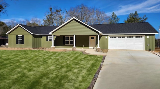 ranch-style house with a garage and a front lawn